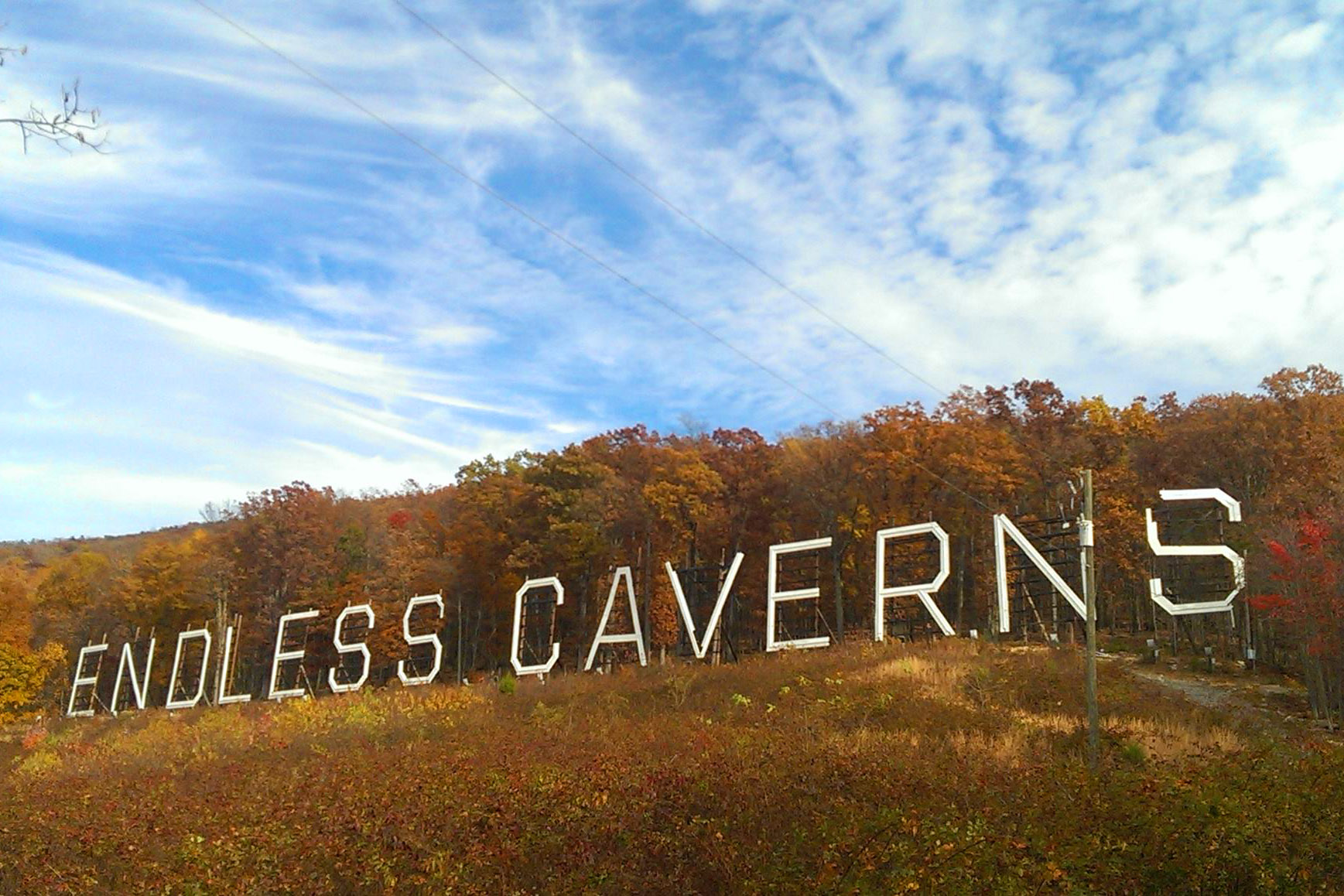 Mountain side displaying the words Endless Caverns